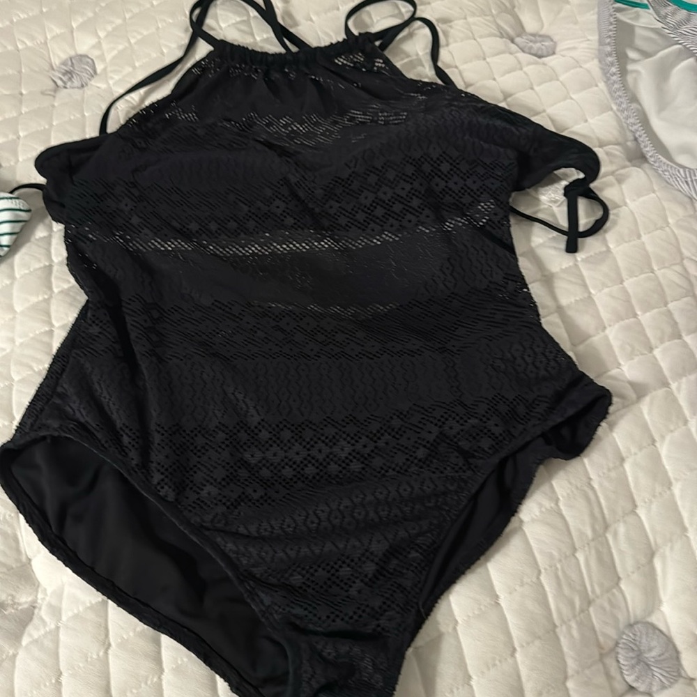 One piece partial see through black swim suit